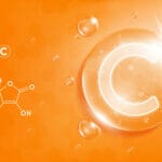 Vitamin C concept fresh liquid in orange